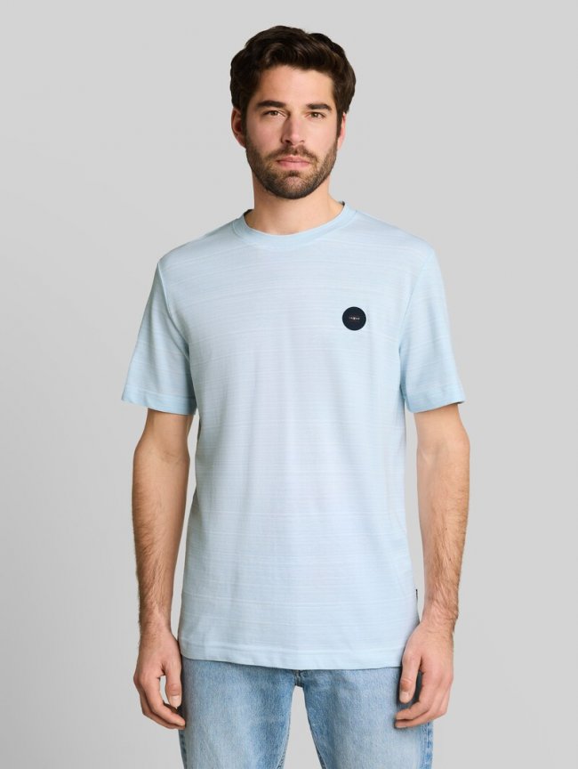 Tom Tailor Piqué T-Shirt mit Logo-Badge - Light Blue Spacedye Pique Tom Tailor Piqué T-Shirt mit Logo-Badge - Light Blue Spacedye Pique