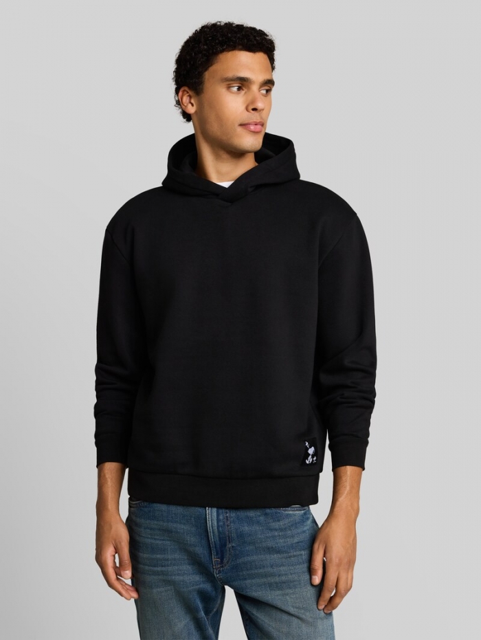 Tom Tailor Relaxed Fit Hoodie Sweatshirt mit Snoopy-Rückenprint - Black Tom Tailor Relaxed Fit Hoodie Sweatshirt mit Snoopy-Rückenprint - Black