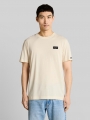 Tom Tailor T-Shirt aus Baumwolle mit Logo-Badge - Gardenia White Tom Tailor T-Shirt aus Baumwolle mit Logo-Badge - Gardenia White
