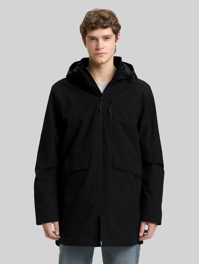 Tom Tailor Relaxed Fit Ultralight Funktionsjacke aus wasserabweisendem Material - Black Tom Tailor Relaxed Fit Ultralight Funktionsjacke aus wasserabweisendem Material - Black