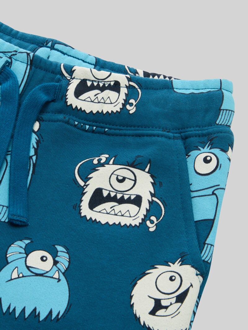 Tom Tailor Basic Jogginghose mit Allover-Print - Bluish Cozy Monster Design